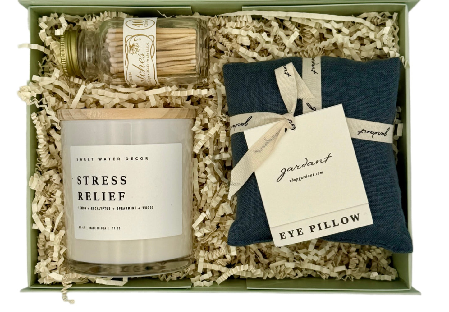 Gift set with 'Stress Relief' candle, 'Eye Pillow', and matchbox in a box.