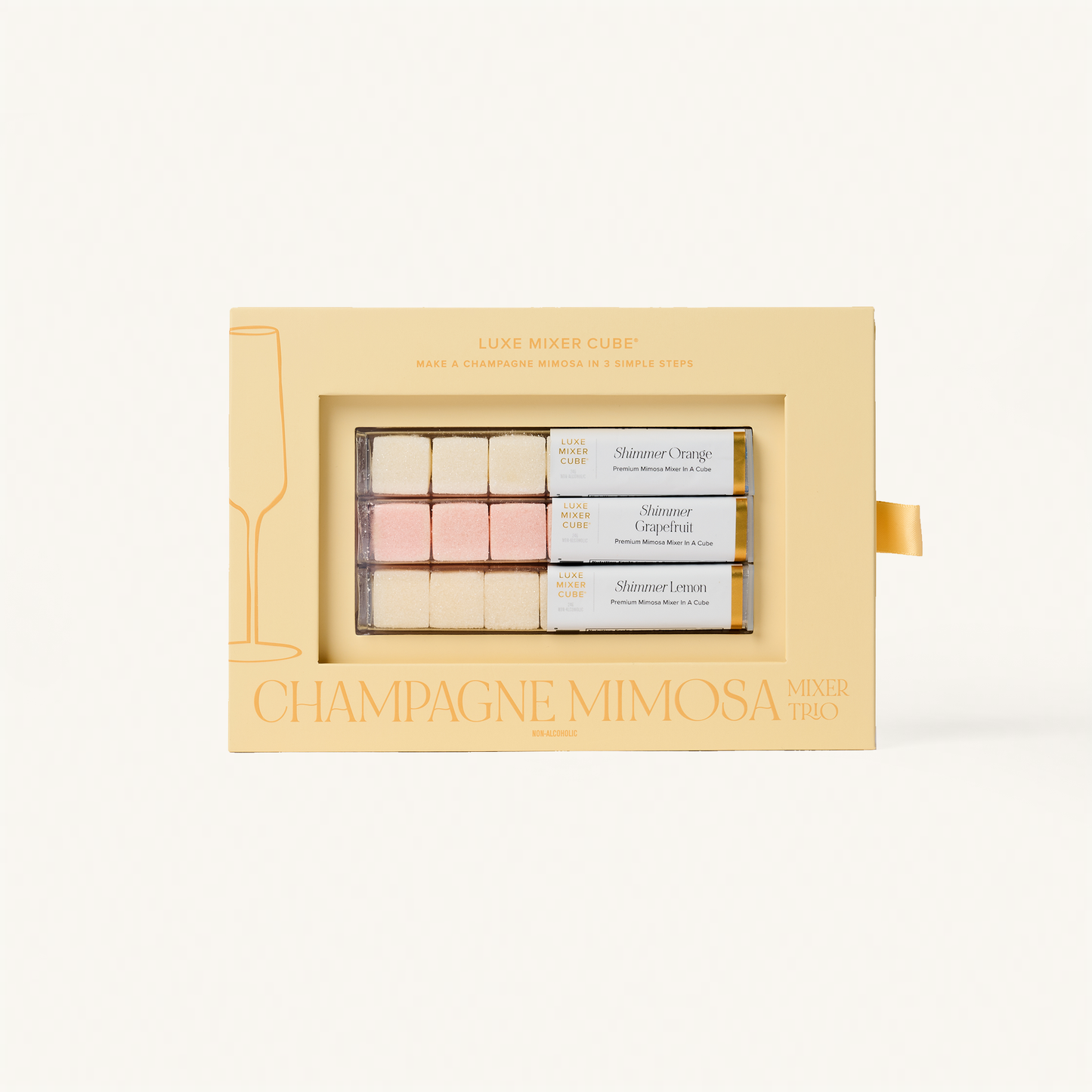 Champagne Mimosa mini gift set in a decorative box on a white background