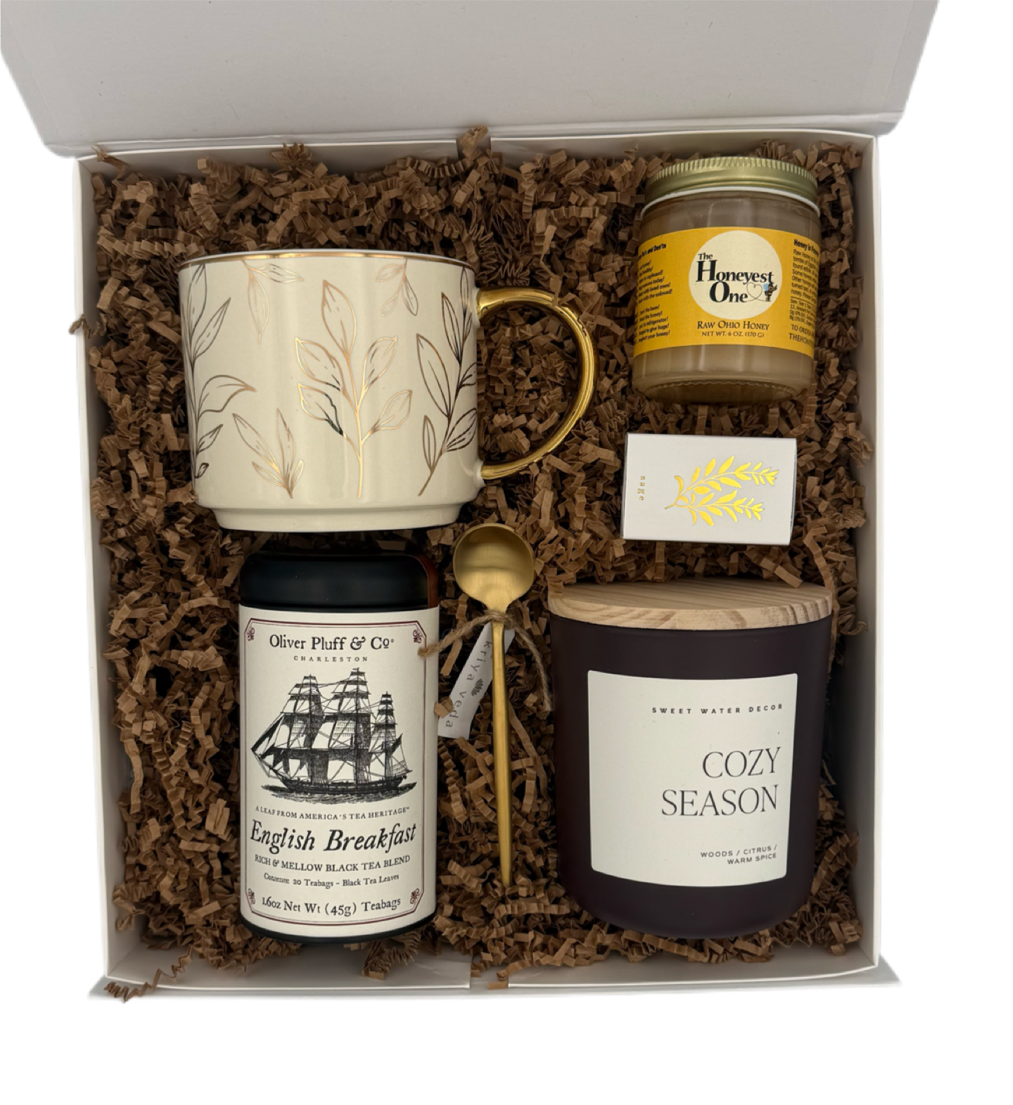 Gift set with mug, tea, and candle in a box