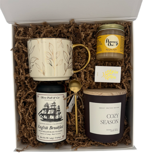 Gift set with mug, tea, and candle in a box