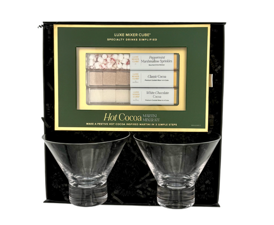 Set of two clear glasses with a packaging box featuring Luxe Mixer Cube and hot cocoa mix.