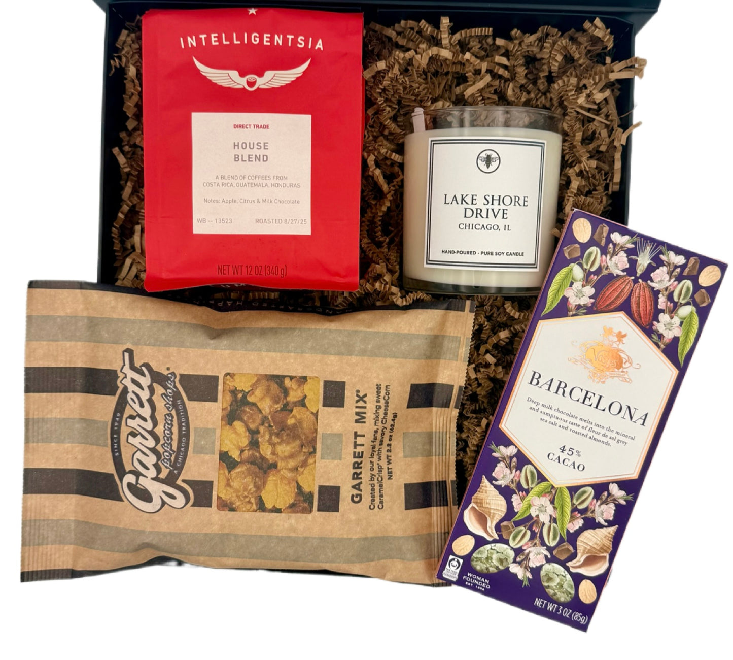 Gift set with Intelligentsia coffee, Garrett coffee mix, Lake Shore Drive candle, and Barcelona chocolate bar.