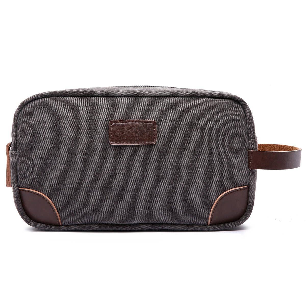 Gray toiletry bag with brown accents on a white background
