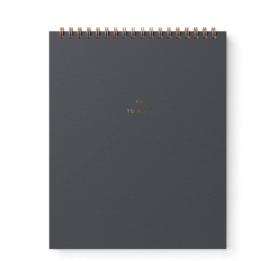 A dark gray spiral-bound notebook with a metallic rose gold wire binding and 'RIP TO NOTE' printed in rose gold foil on the front cover, shown on a plain white background.