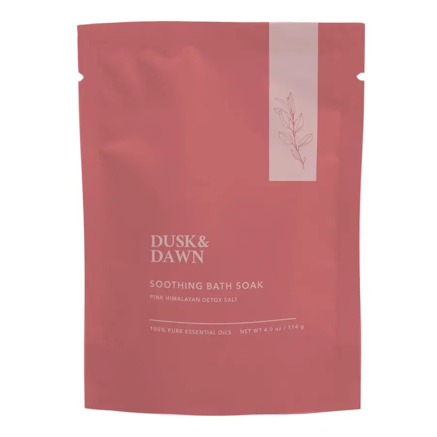 Red package of Dusk & Dawn soothing bath soak on a white background