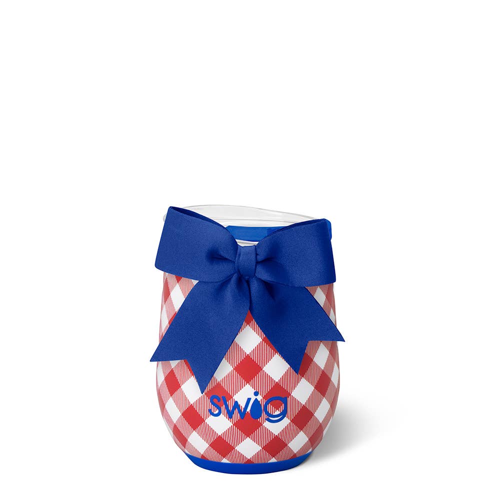 Stemless wine glass with red and white checkered pattern and blue bow, featuring the 'Swig' brand.