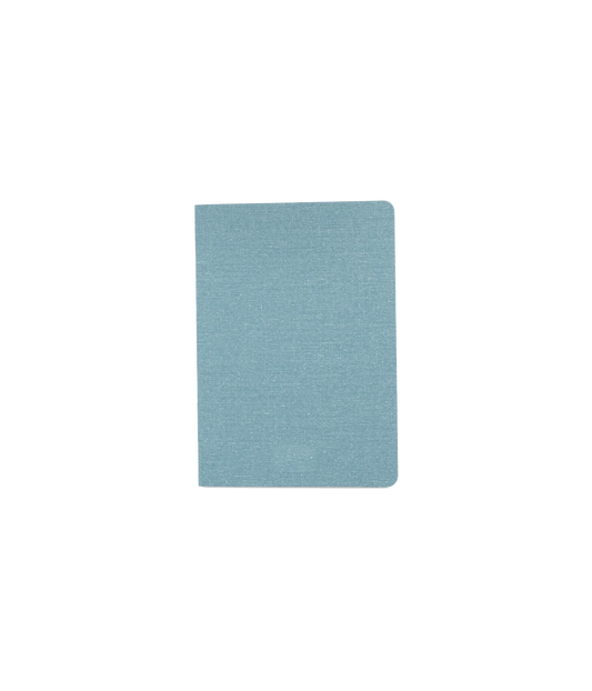 Light blue textured notebook on a white background
