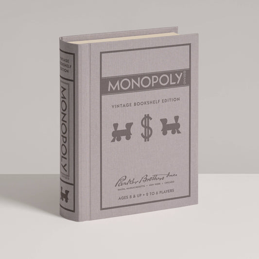 Monopoly vintage bookshelf edition packaging on a gray background