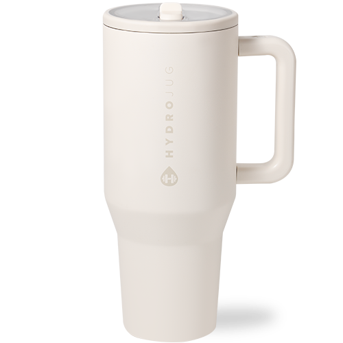 White travel mug with a lid on a white background