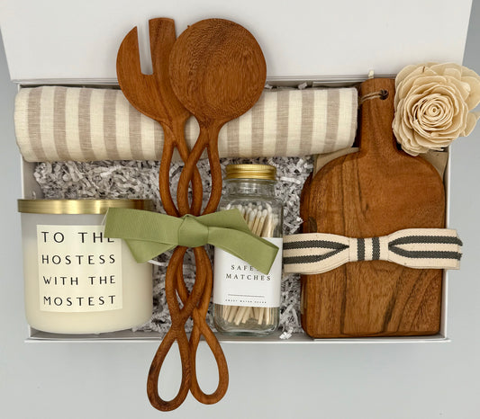 Gift set with wooden utensils, candle, and matches in a box