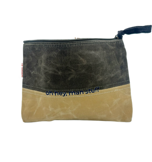 Two-toned pouch with 'oh hey, man stuff' text on a white background