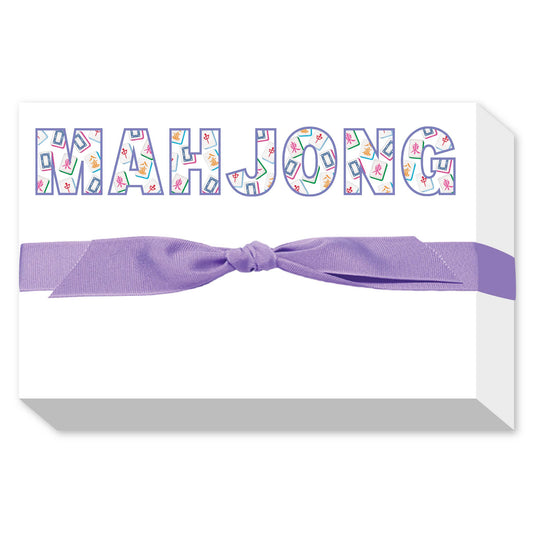 Box of Mahjong tiles with a purple ribbon on a white background