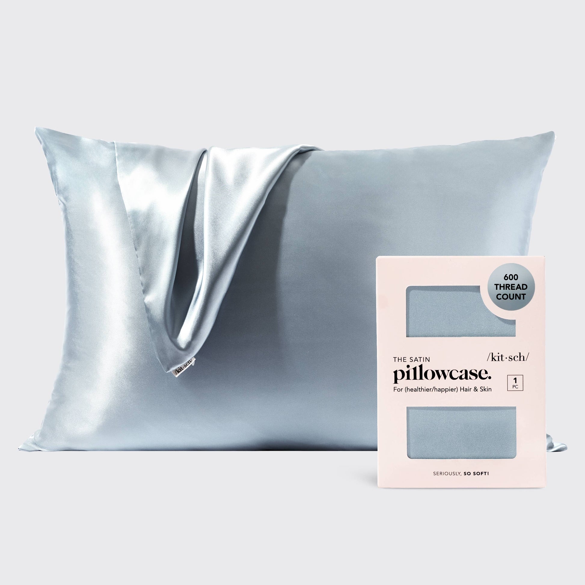 Silky pillowcase with packaging on a light gray background