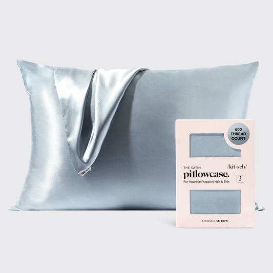 Silky pillowcase with packaging on a light gray background