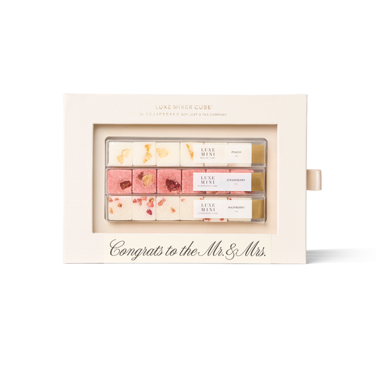 Set of lip balms in a decorative box with 'Congrats to the Mr & Mrs' text on a white background.