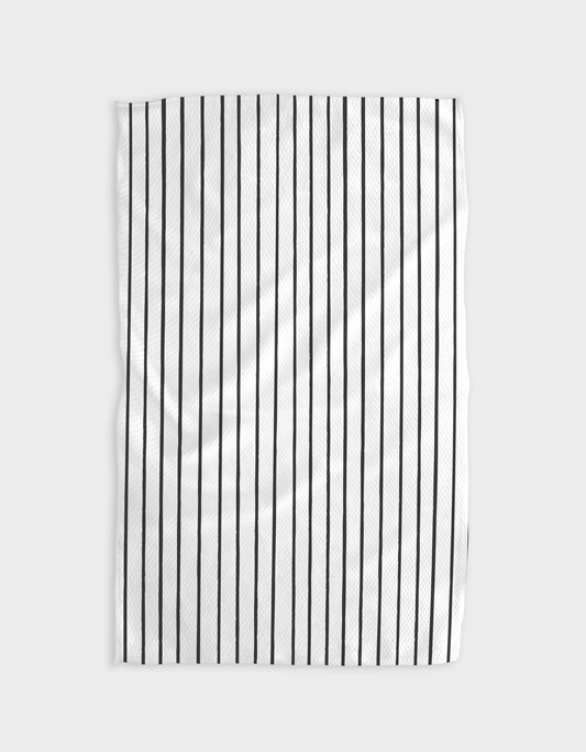 Black and white striped towel on a light gray background