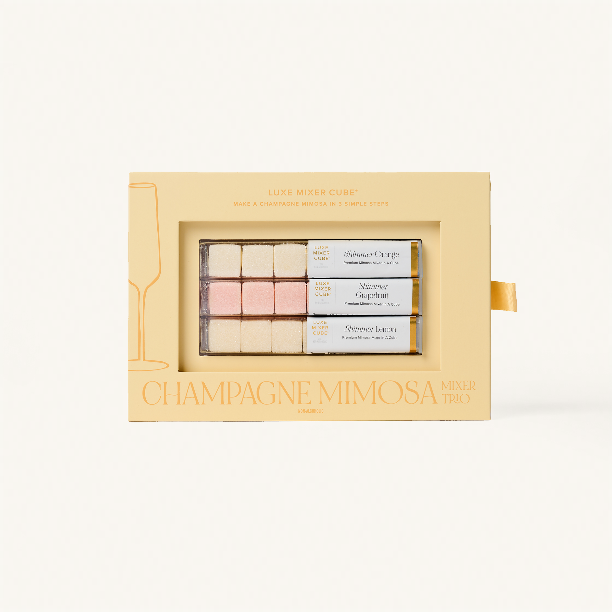 Champagne Mimosa mini gift set in a decorative box on a white background