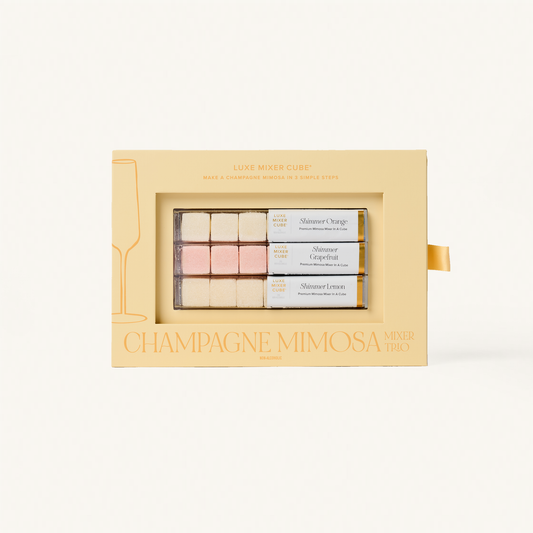 Champagne Mimosa mini gift set in a decorative box on a white background