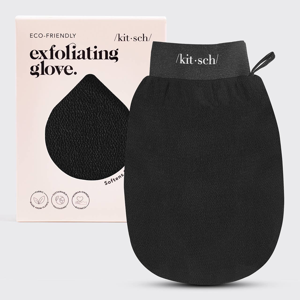 Black exfoliating glove with packaging on a light gray background