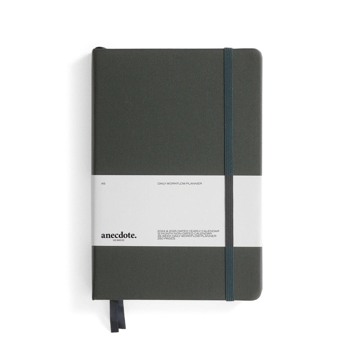 Black notebook with a white label on a white background