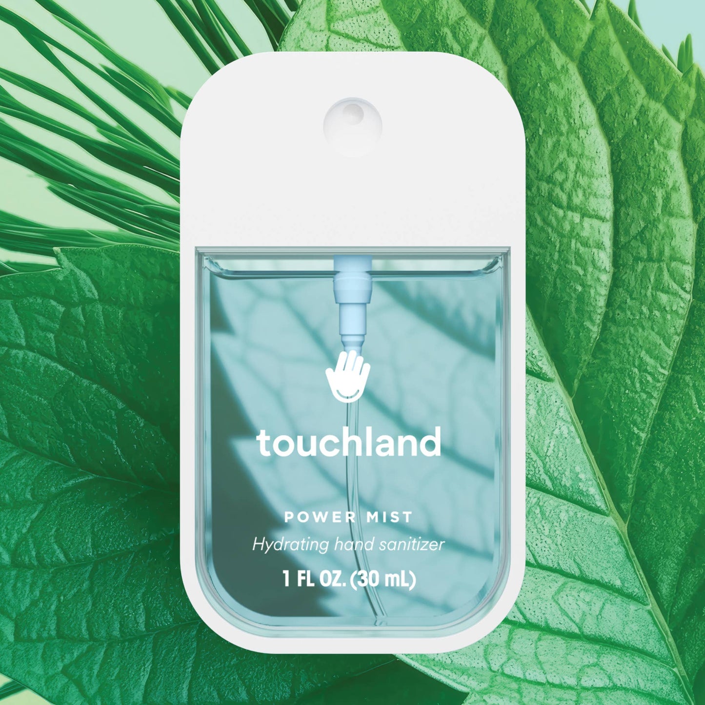Touchland power mist hydrating hand sanitizer packaging on a green leaf background