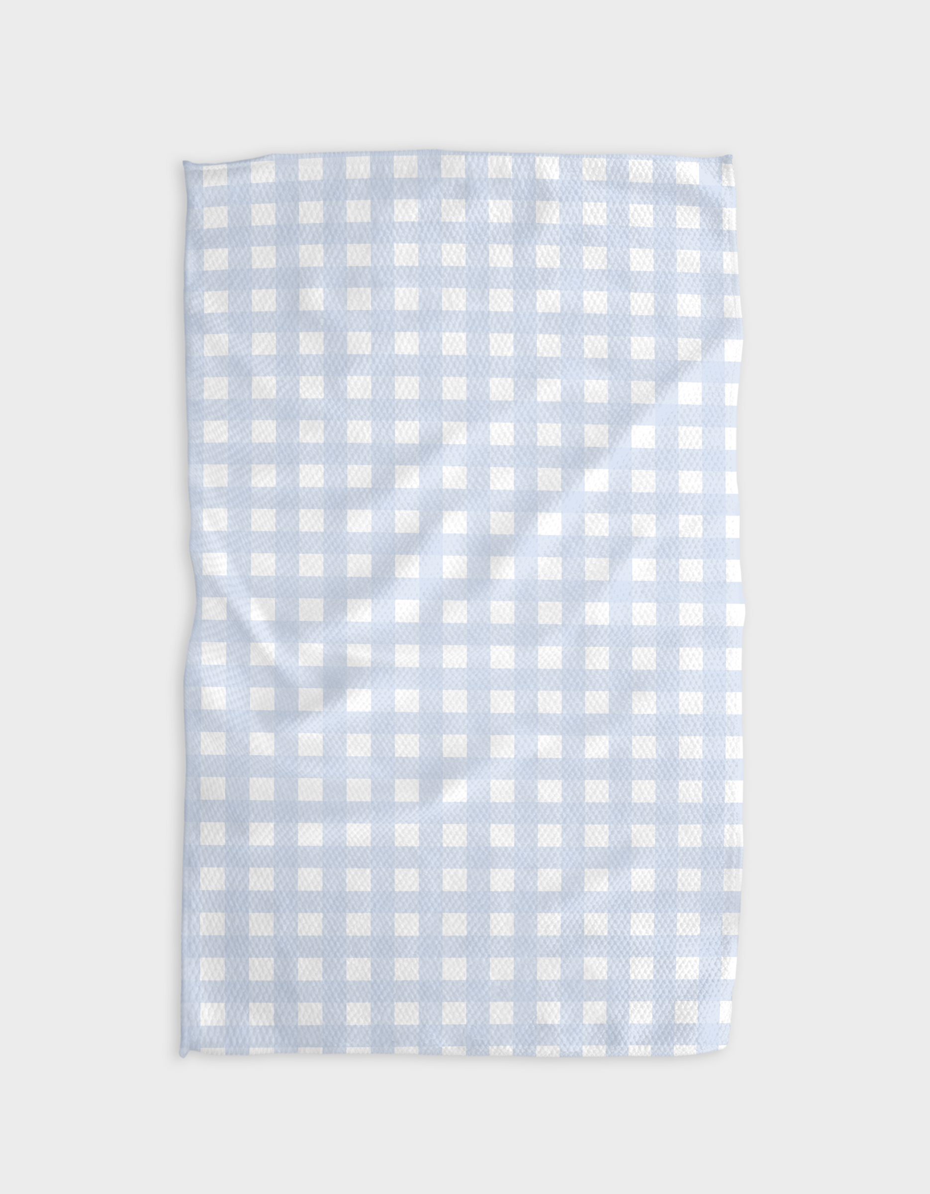 Light blue and white checkered towel on a light gray background
