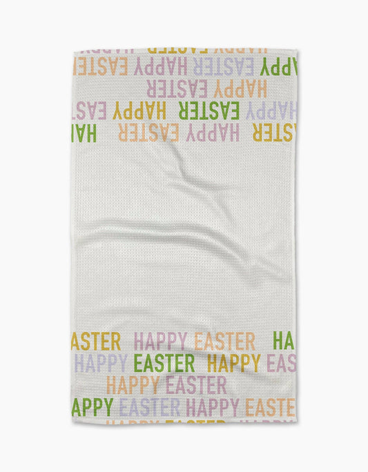 White towel with 'Happy Easter' text in various colors on a white background