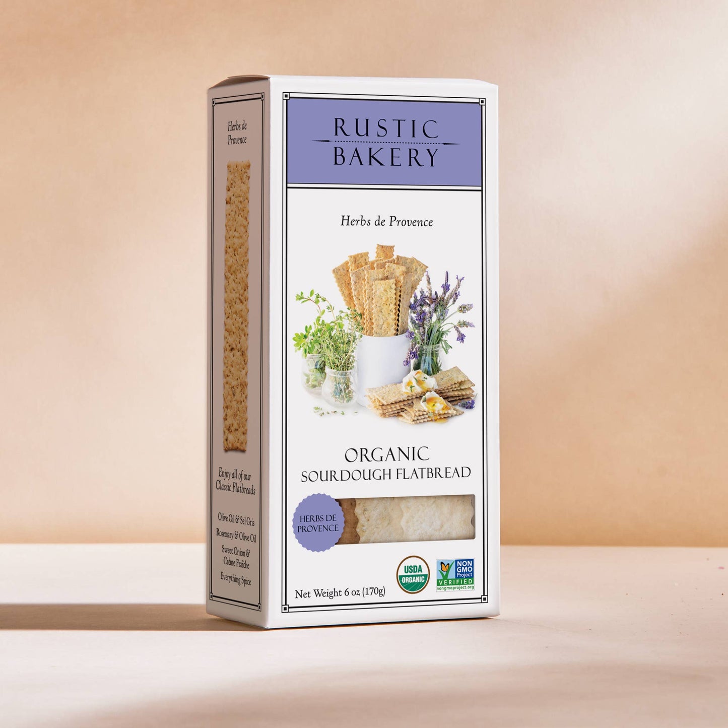 Box of Rustic Bakery organic sour dough flatbread on a beige background