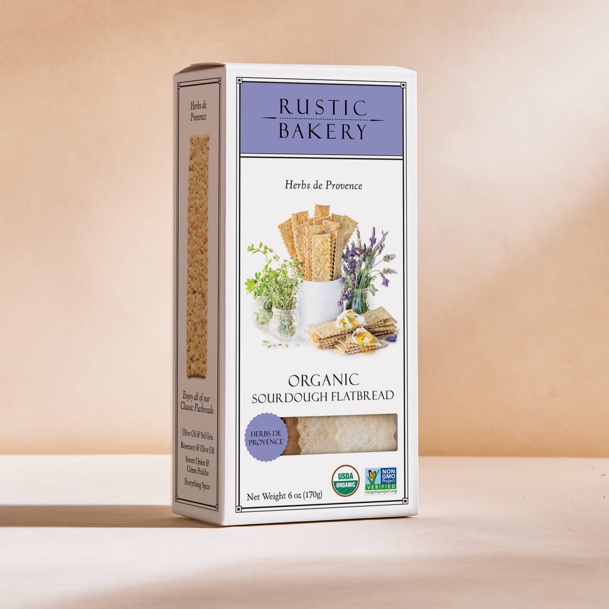 Box of Rustic Bakery organic sour dough flatbread on a beige background