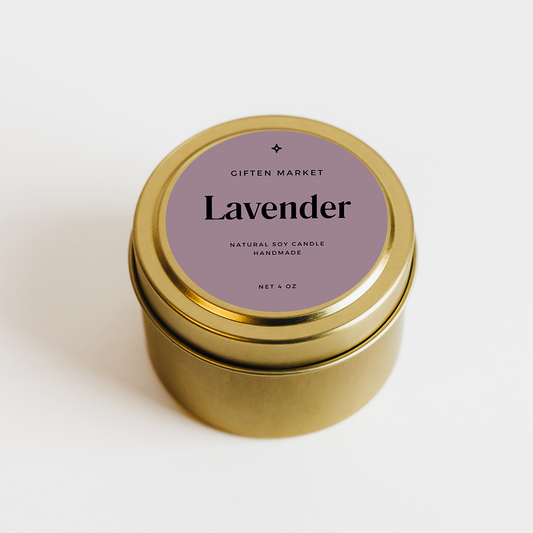 Gold candle tin with lavender label on a white background