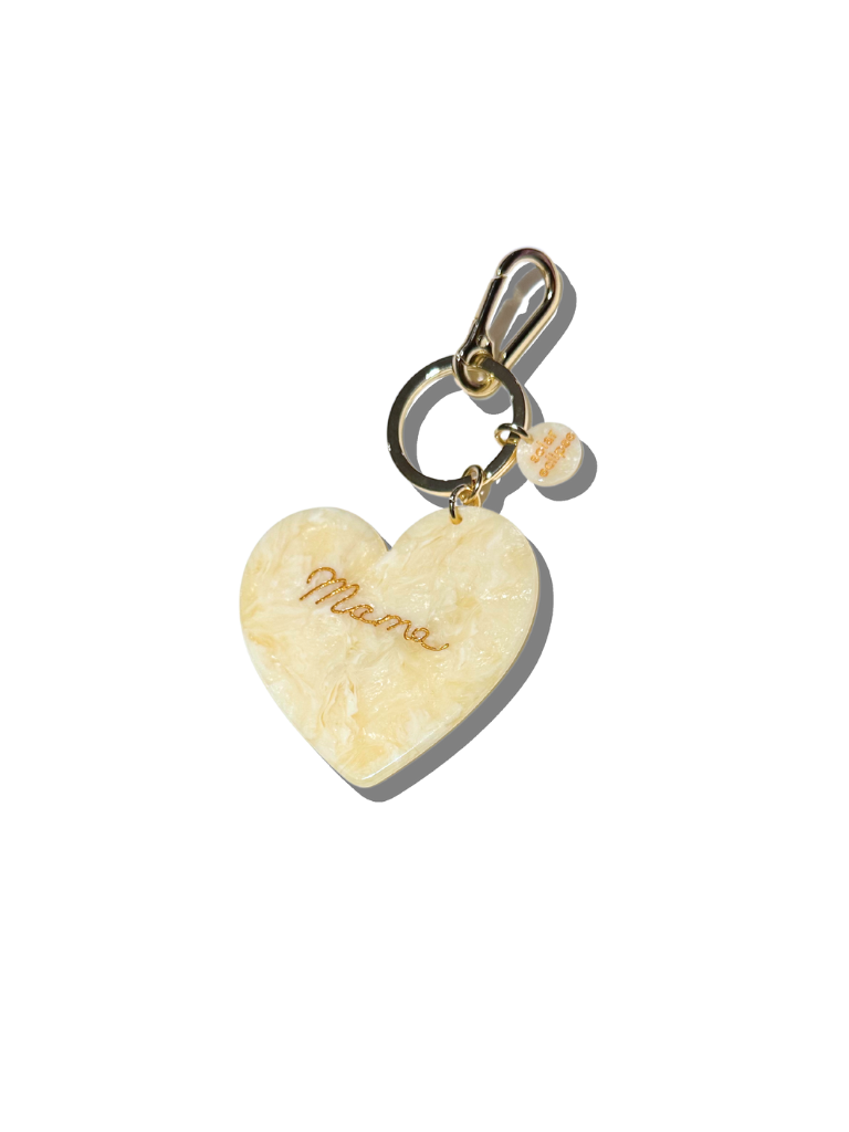 Heart-shaped keychain with 'Mama' engraving on a white background