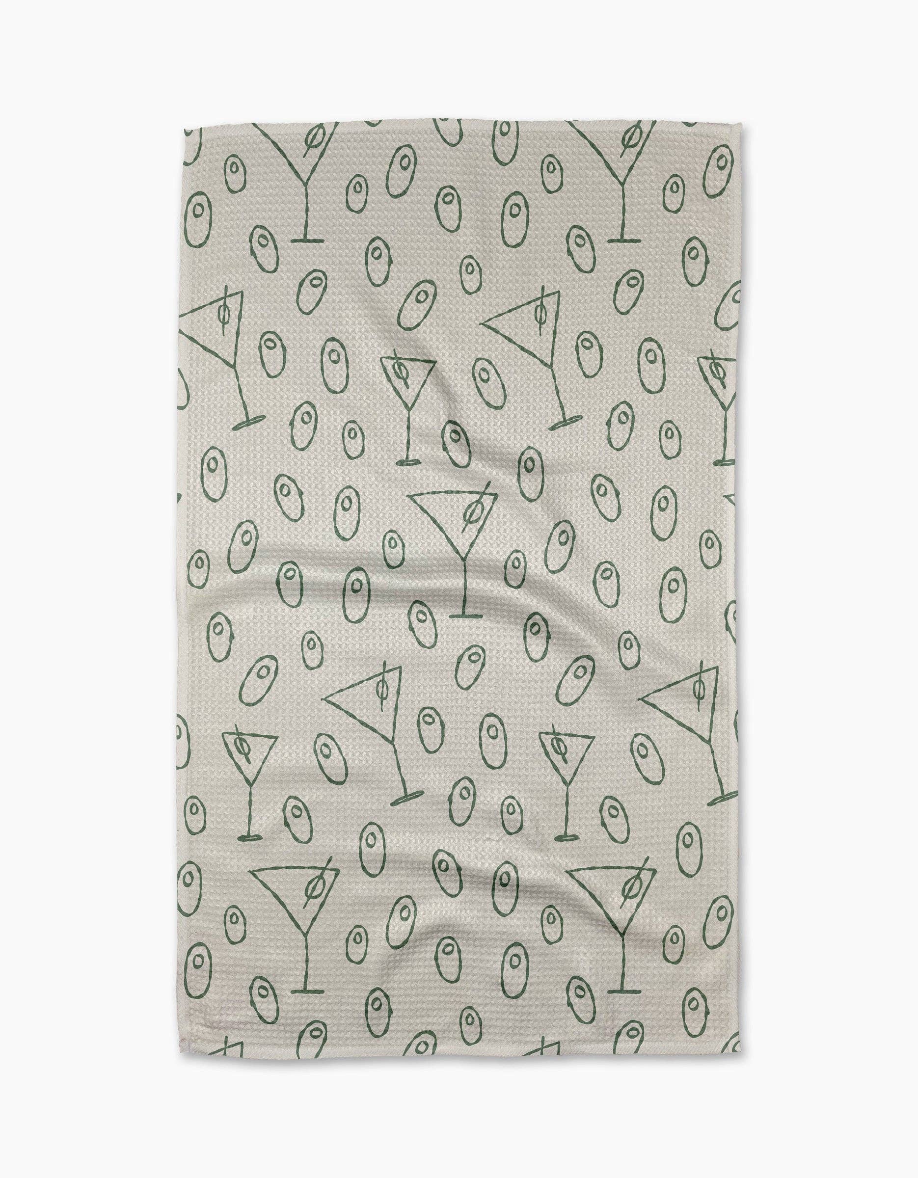 Tea towel with martini glass pattern on a white background