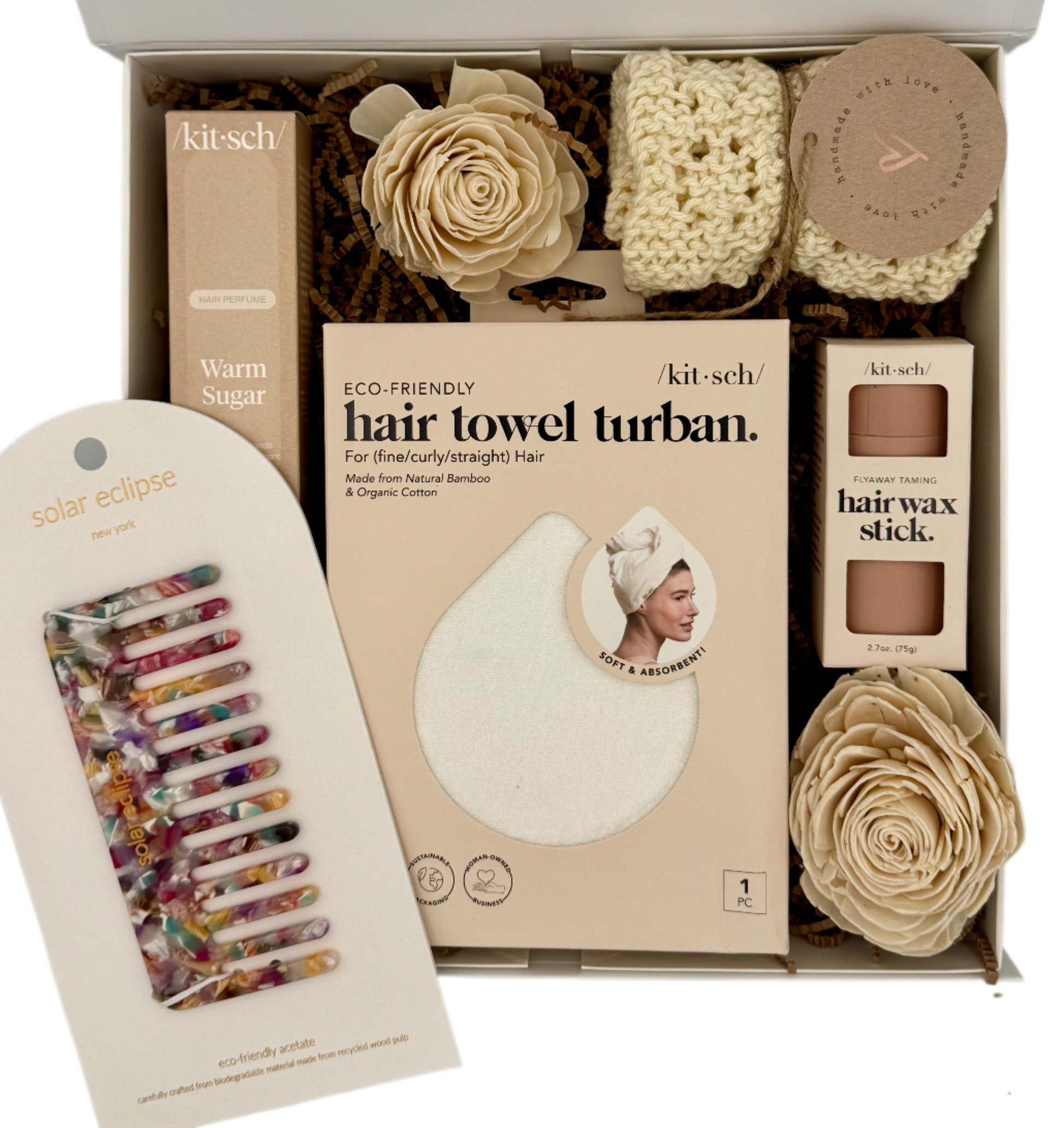 Kit-sch hair care product set including a hair towel turban, hair wax stick, and hair clips in a box.
