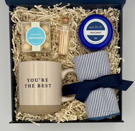 Gift set with mug, matches, and napkins in a box