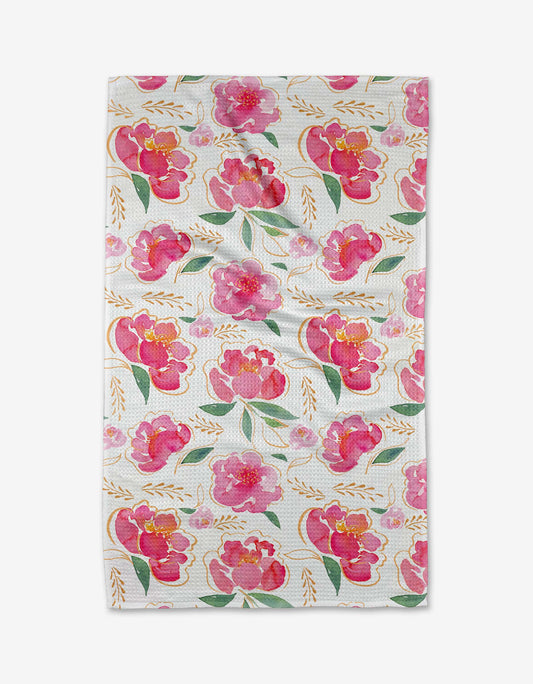 Floral patterned fabric with pink flowers on a white background