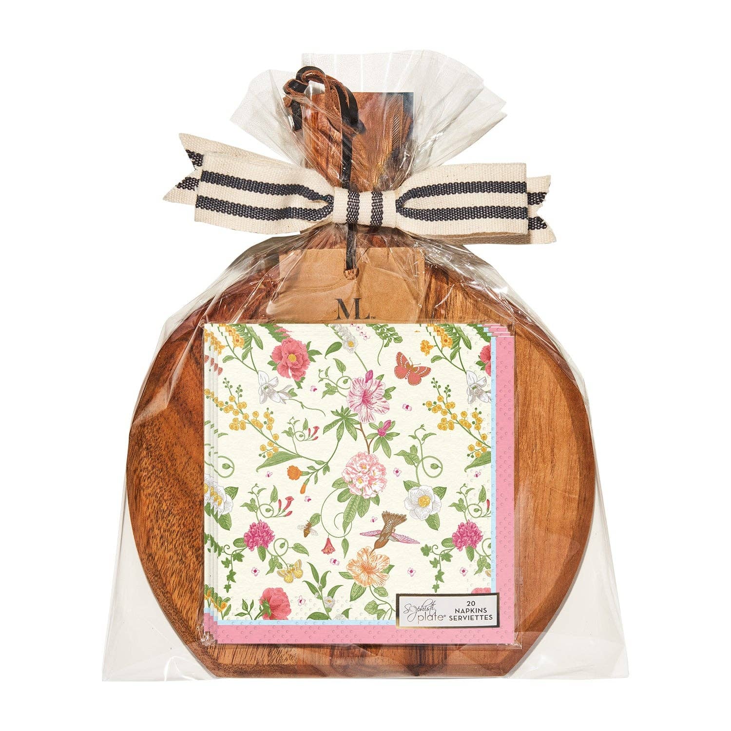 Wooden cutting board with floral-patterned napkins and a decorative ribbon on a white background