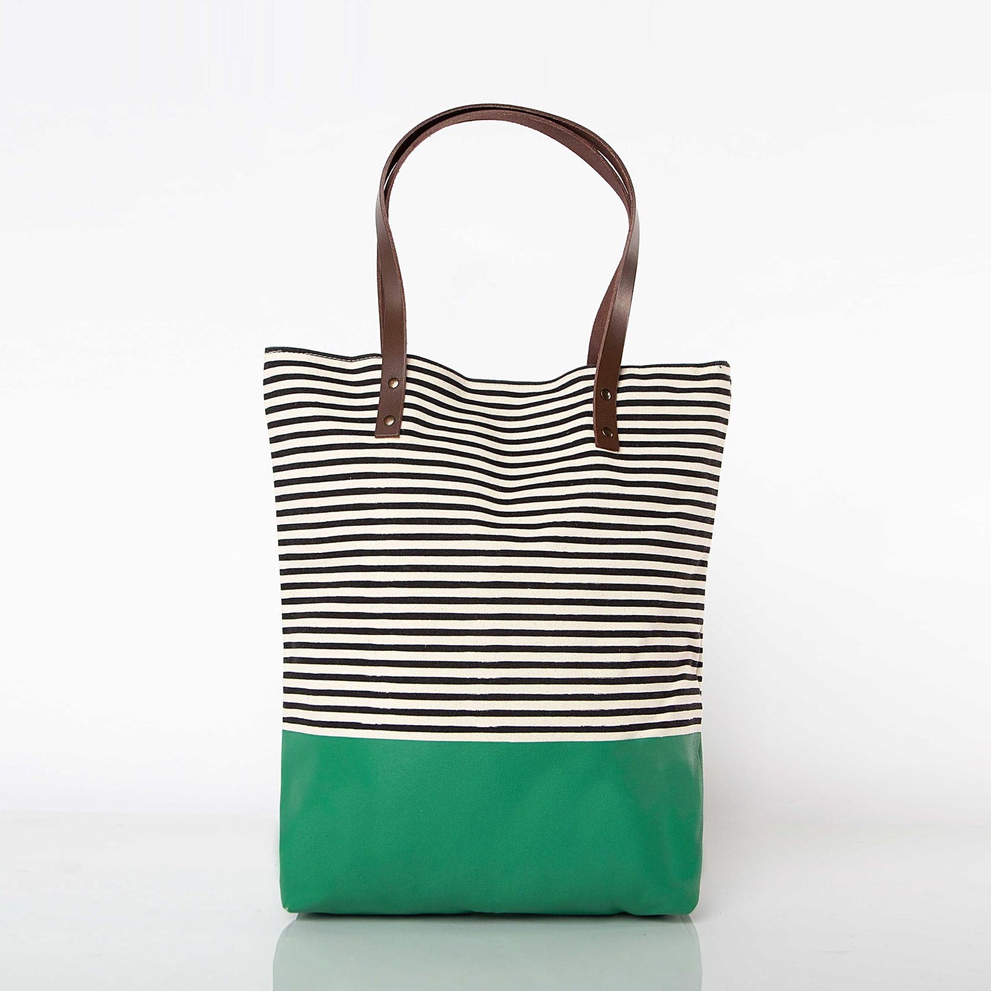 Striped tote bag with green base on a white background