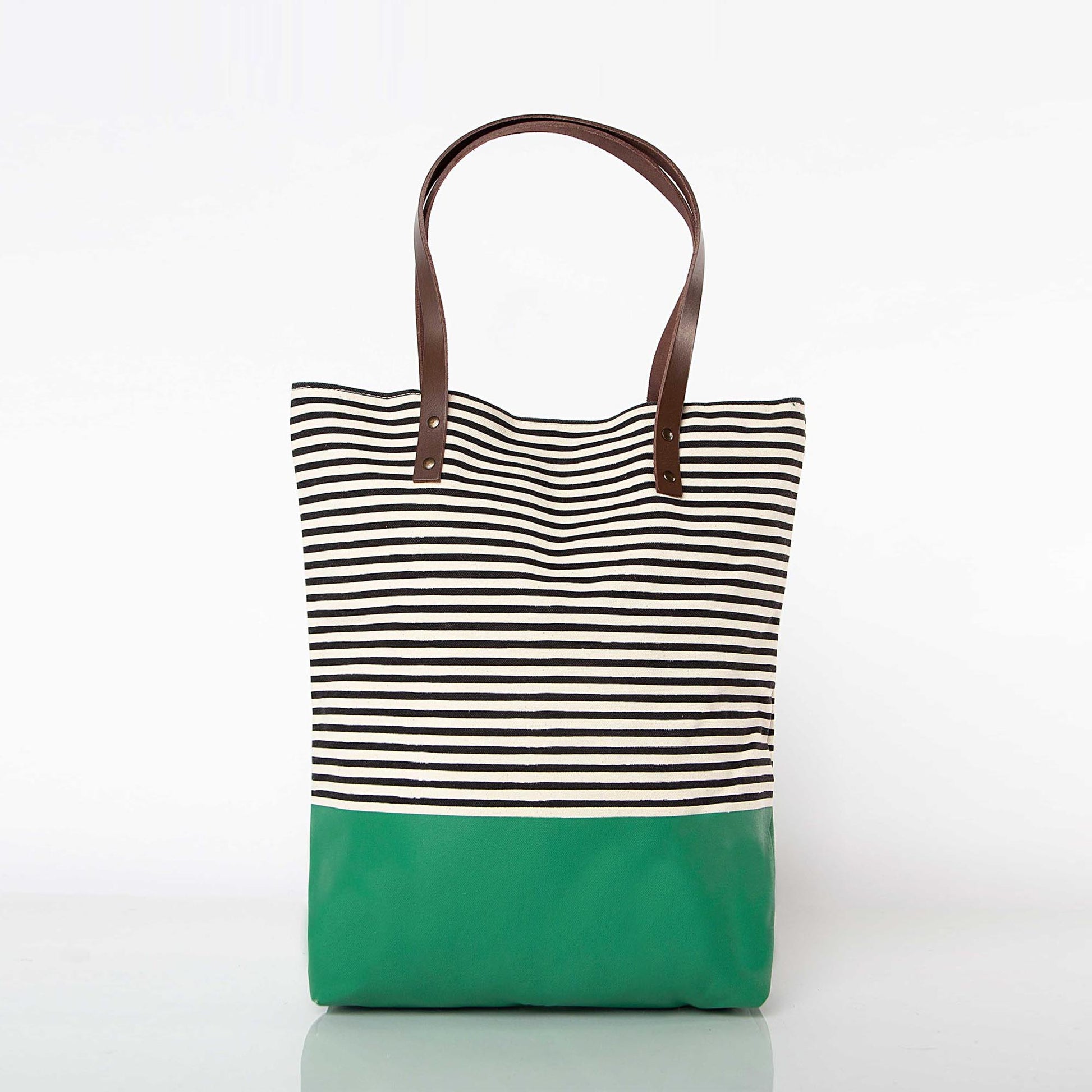 Striped tote bag with green base on a white background