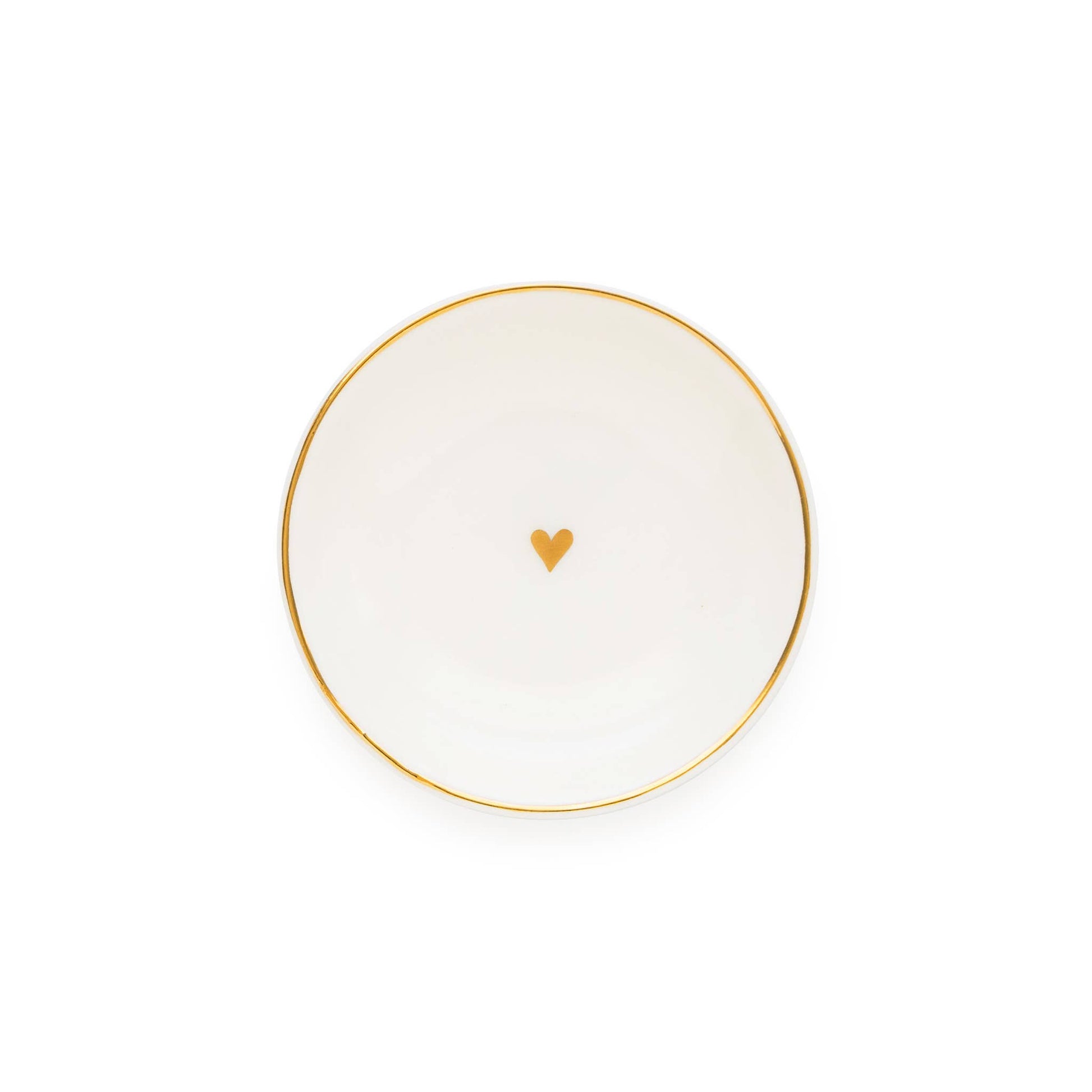 White plate with a gold rim and heart design on a white background