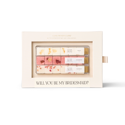 Miniature perfume set with 'Will You Be My Bridesmaid?' message on a white background