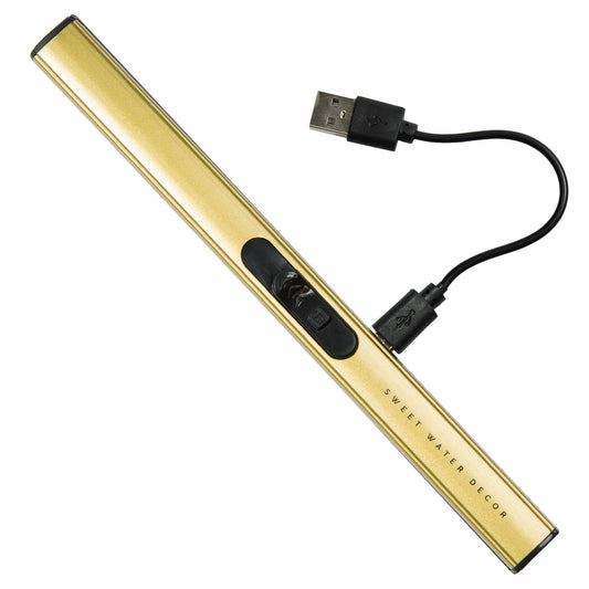 Gold LED strip light with USB cable on a white background
