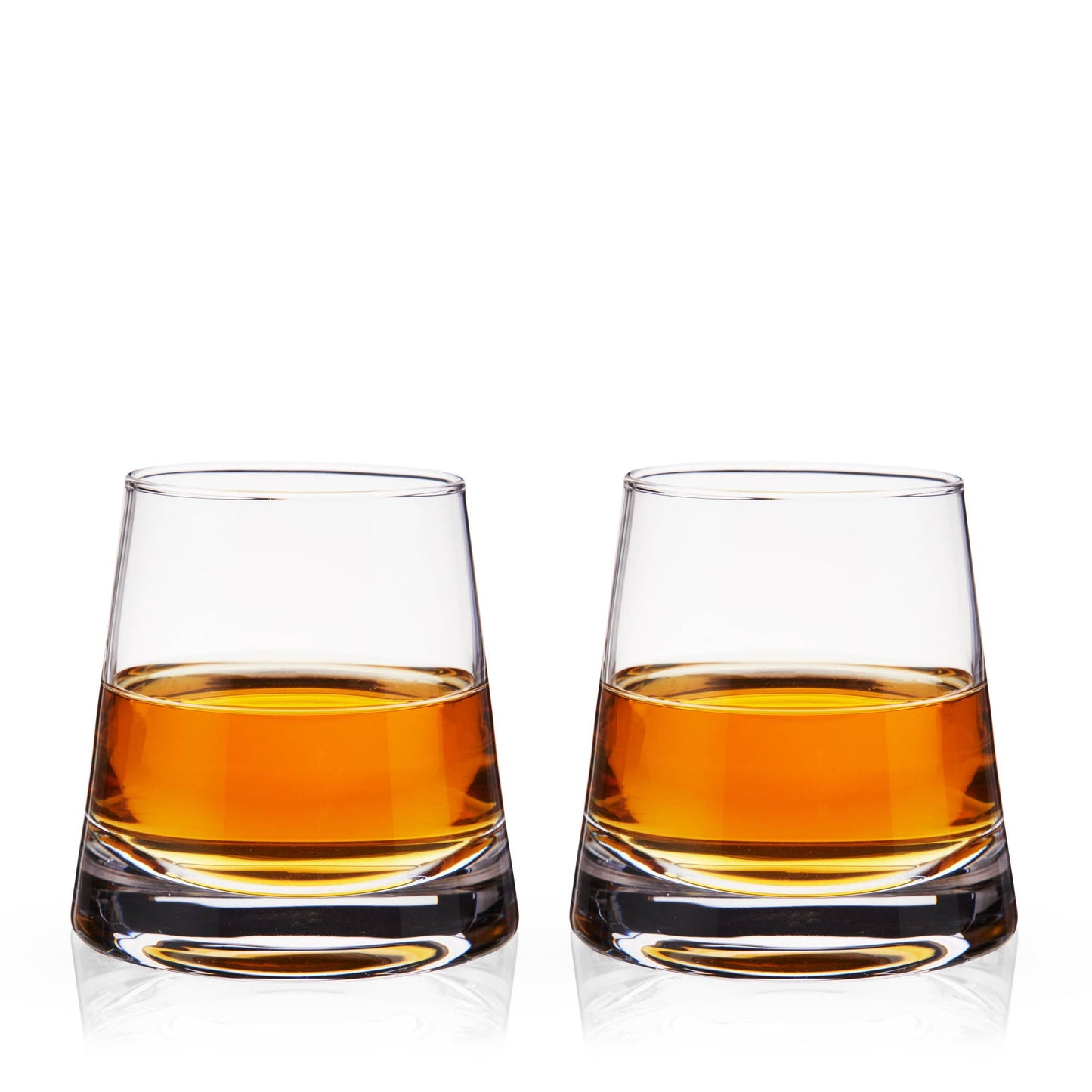 Two glasses of amber liquid on a white background