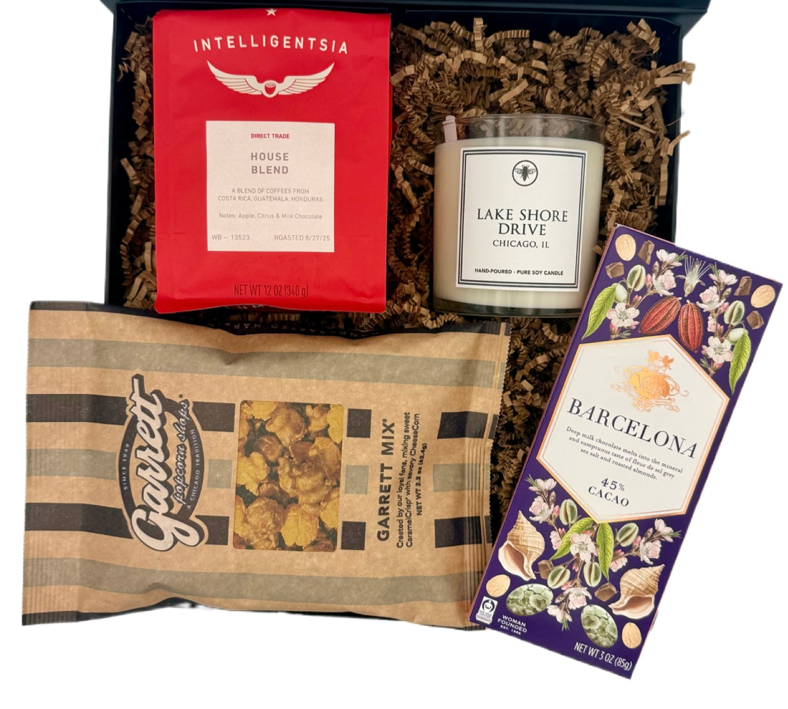 Gift set with Intelligentsia coffee, Garrett coffee mix, Lake Shore Drive candle, and Barcelona chocolate bar.
